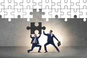 Concept of businessman with missing jigsaw puzzle piece