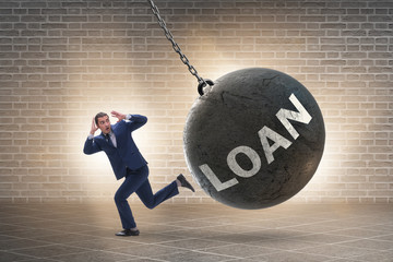 Businessman in debt and loan concept