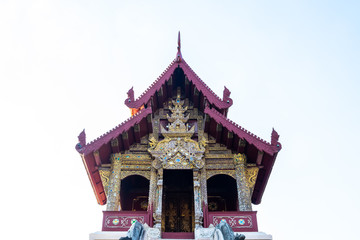 Naklejka premium View of a the red building in Wat Phra Singh, the popular landmark of temple in Chiang Mai, Thailand