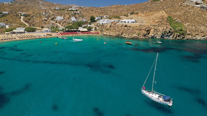 Aerial drone photo of iconic organised beach of Super Paradise with emerald clear sandy seascape,...