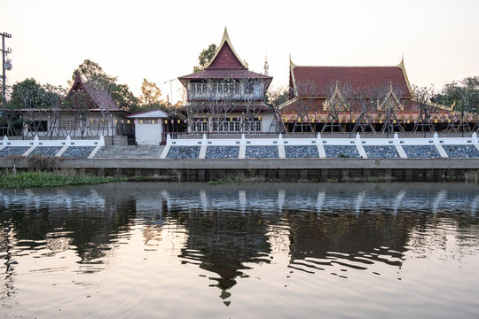 View of the old temple in the evening along with Khot river at Wat Tanod, Phra Nakhon Si Ayutthaya, Thailand