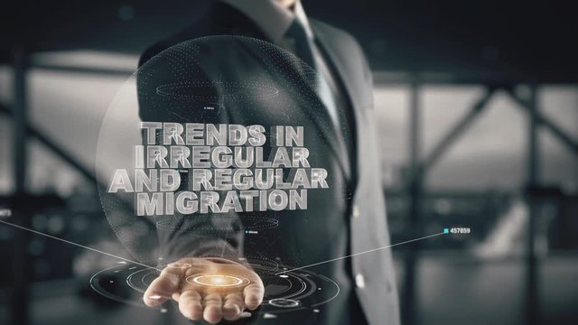 Trends in Irregular and Regular Migration with hologram businessman concept