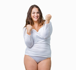Beautiful plus size young overwight woman wearing white underwear over isolated background excited...