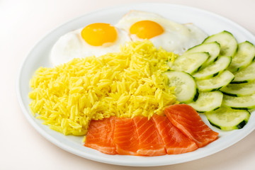 Healthy rice breakfast with fish and eggs