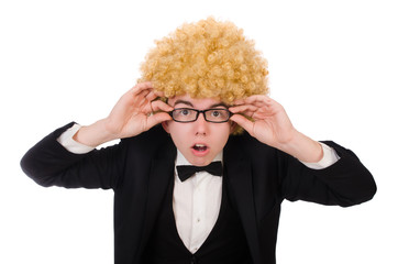 Young man wearing afro wig