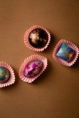 Bonbons set from above on brown background