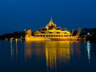 Karaweik Palace by night. In Yangon, Myanmar