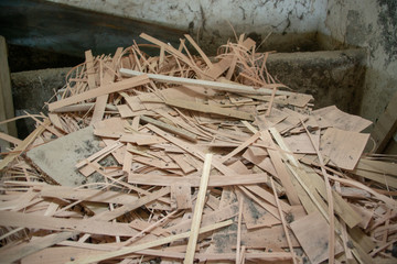 Taking photographs of wood plywood, used for making pellets