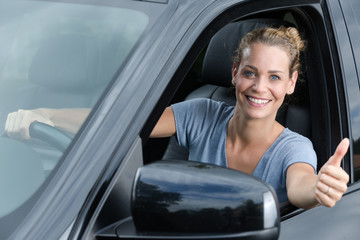 woman showing thumbs up