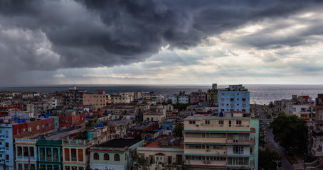 Aerial Panoramic view of the Havana City, Capital of Cuba, during a dramatic and storm cloudy day.