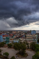 Aerial view of the Havana City, Capital of Cuba, during a dramatic and storm cloudy day.