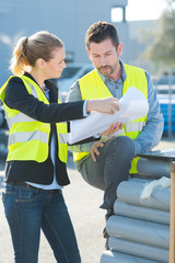 Obraz premium woman and man working outdoors