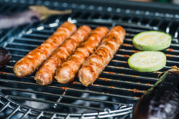 sausages grilled with vegetables zucchini
