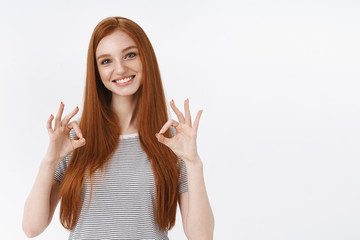 Okay agree. Attractive pleasant friendly-looking redhead teenage girl blue eyes tilting head amused...