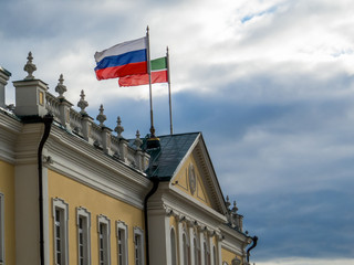 The flags of the Republic of Tatarstan and of the Russian Federation on the Kazan Kremlin. In...