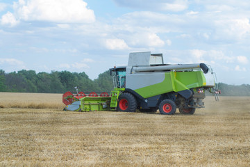 Harvesting wheat and barley modern combine.