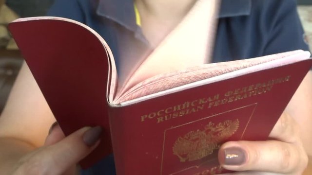 Russian passport (passport of Russian Federation) in the female hands