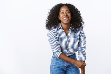 Wellbeing happiness people concept. Entertained charming friendly carefree african american woman...