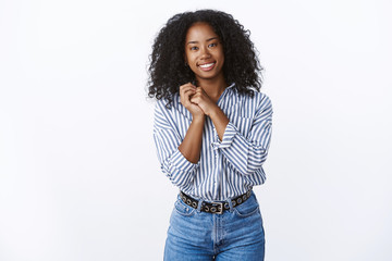 Cute tender feminine african-american woman pleased romantic boyfriend gesture press palms together silly looking caring thankful, standing grateful appreciate effort, grinning white background