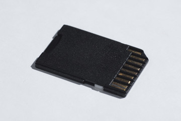 Mini SD memory card on white background close up