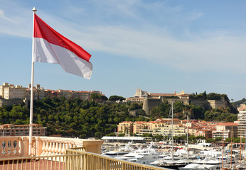 Flag of Monaco waving at the centr of  Monaco.