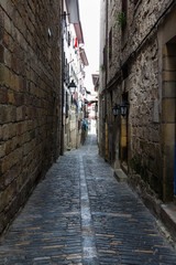 Narrow street in an old town in the north of spain.