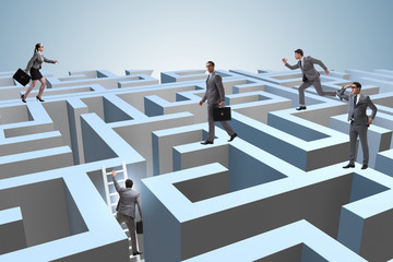 Business people trying to escape from maze
