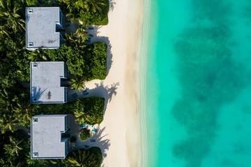 Aerial view of beautiful island at Maldives in the Indian Ocean. Top view from drone.