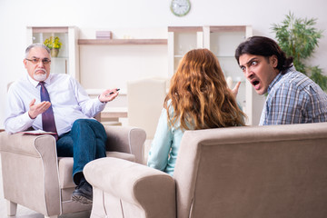 Young pair visiting experienced doctor psychologist