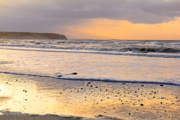Obraz premium sunset on the beach at Asnelles Normandy France