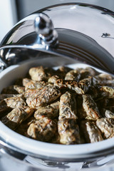 Tray of snacks at a banquet or reception. Catering buffet at party. Buffet table welcome drink concept