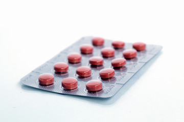pills in blister isolated on white background