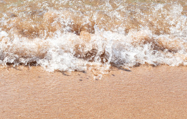 Sea wave on the beach. Macrophoto.