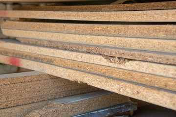 Taking photographs of wood plywood, used for making pellets