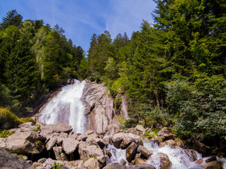 Fototapeta na wymiar Amola Waterfalls (Italian: Cascate d'Amola), Val Nambrone, Trentino-Alto Adige, Dolomites, north Italy