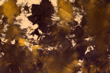 abstract aged orange randomly painted canvas, fabric with color paint spots and blots texture for background use.