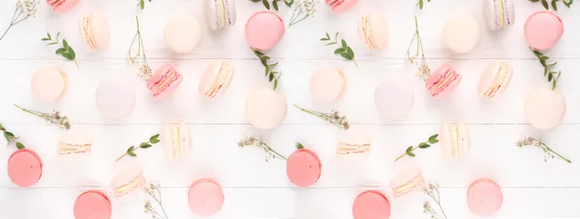 Cercles muraux Macarons banner for website. Colorful French or Italian macarons stack on white wood table with copy space for background. Dessert for served with afternoon tea or coffee break