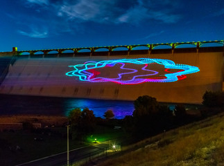 Light show projected onto dam