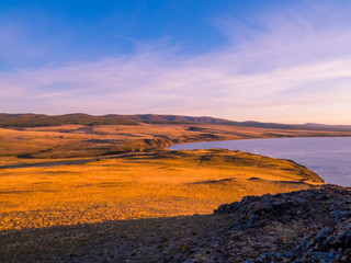 Magical sunset on the Olkhon Island, Lake Baikal, Siberia, Russia