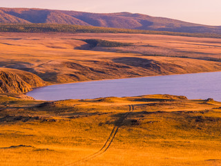 Magical sunset on the Olkhon Island, Lake Baikal, Siberia, Russia