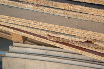 Taking photographs of wood plywood, used for making pellets