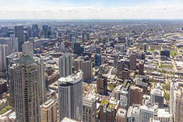 Chicago city skyscrapers aerial view, blue cloudy sky background. Skydeck observation