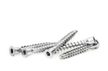 Screws still life large self tapping screws on white background. Selective focus.