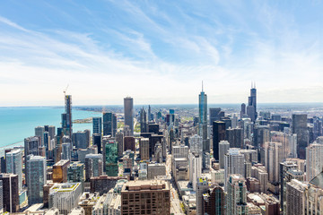 Fototapeta na wymiar Chicago city skyscrapers aerial view, blue sky background. Skydeck observation