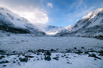 Fototapeta na wymiar Mount Cook during winter in New Zealand. There are glacier, ice, icebergs, rocks and snow mountain in this wilderness area. This place is great for tourist who like adventure and discovery.