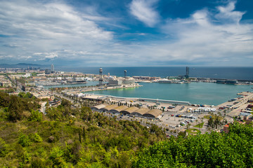 Barcelona, Spain - April, 2019: Barcelona and port Port Vell from natural park Montjuic, Spain