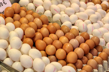 Mixed brown and white eggs ready to be sold at the market