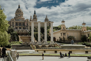 BARCELONA, SPAIN - April, 2019: View and the fountains at the Palau Nacional, a palace constructed for the 1929 International Exhibition in Barcelona