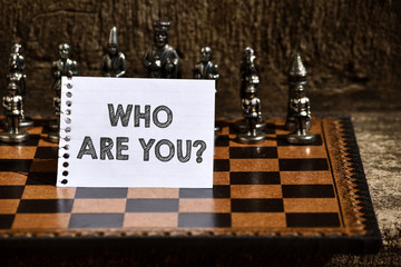 Writing note showing Who Are Youquestion. Business concept for someone asking your demonstratingal...