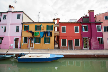 Fototapeta na wymiar colorful houses on canal in Burano island italy